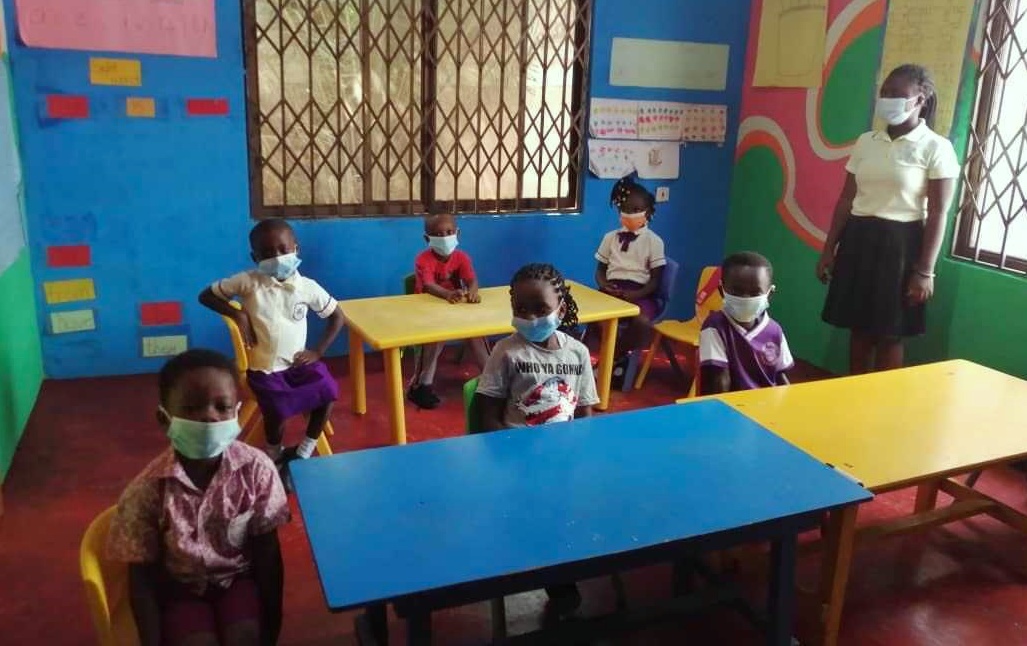 Ghana Primary school students in classroom with COVID masks
