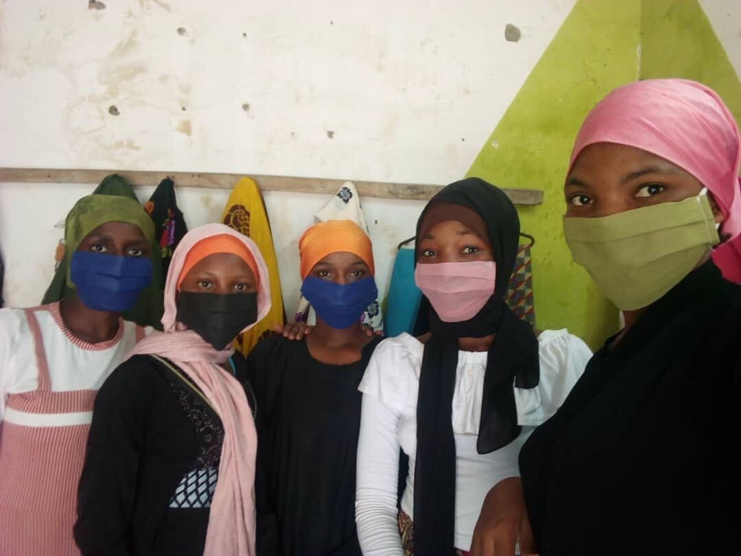 School girls wearing masks